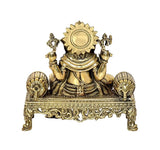 Front view brass Ganesha statue idol with halo-like back disc, 4 inch height