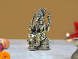 Lakshmi Narasimha brass showpiece statue with one raised hand and consort figure, side view