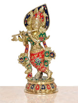Brass Krishna playing flute idol statue, full view with blue halo and red-green patterned robe.