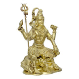 Brass Shiva idol statue with raised right arm, trident in left, seated on lion