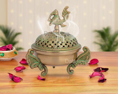 Green brass loban dhoop dani with peacock finial and perforated dome, 6 inch