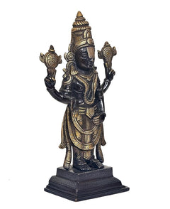 Brass Tirupati Balaji statue idol, angled view of face and headdress, dark blue and gold