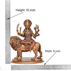 Resin Durga Maa idol with lion, height 10 inch, width 8 inch shown on ruler