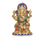 Brass Ganesha murti, multicolor gemstone-style trim, raised hands, on circular base