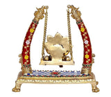Brass Ganesha swing showpiece backside view, gold figure on decorated base