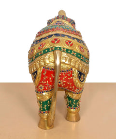 Brass elephant figurine rear view, decorated back panels and gold-tone legs with multicolor trim
