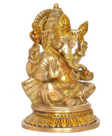 Ganesha idol statue with raised hand pose, gold finish on lotus base