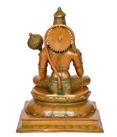 Back view of Brass Hanuman idol, engraved halo, seated pedestal details
