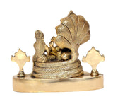 Rear view of golden brass Maa Lakshmi and Lord Vishnu on Sheshnag base