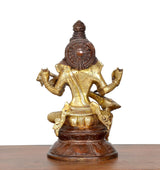 Back view brass Saraswati statue with veena, rounded crown and patterned back plate