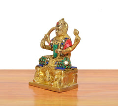 Santoshi Maa brass statue, side view; teal center panel, blue trims, gold pedestal base