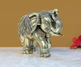 Brass elephant figurine side view, engraved face and decorative ear, 5 in tall