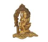 Saraswati Maa seated metal idol, gold tone, angled side view with carved backrest