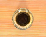 Top view of brass kalash lota opening with engraved rim and decorative inner design