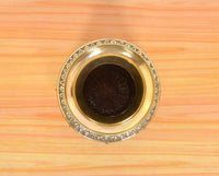 Top view of brass kalash lota opening with engraved rim and decorative inner design