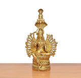 Golden brass sculpture of Padmavati devi seated with many-armed circular halo