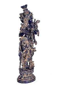 Krishna idol figurine back/side view, blue highlights, intricate carved ornamented base