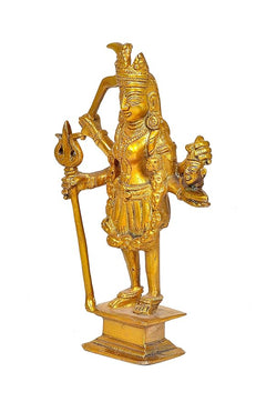 Golden brass Kali Maa figurine with trident and small companion figure, full view