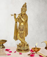 Krishna brass idol figurine playing flute, ornate crown and draped robe