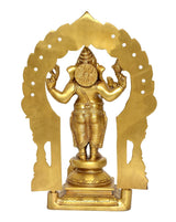 Back view of brass standing Ganesh with prabhavali arch and circular halo