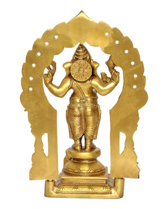 Back view of brass standing Ganesh with prabhavali arch and circular halo