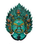 Green Mahakal wall hanging resin mask, front view with decorated crown and open mouth