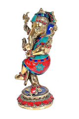 Dancing Ganesha brass idol side view, teal headgear, red sash, jeweled waist details