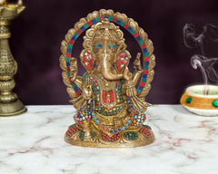 Brass Ganesha statue (10 inch), multicolor jeweled halo and ornate deity details