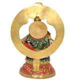 Back view of brass Lord Ayyappa statue with large circular arch and painted robe