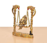 Ganesha swing statue on patterned base with hanging chain links, multicolor