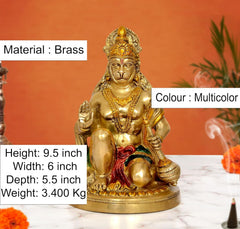 Seated Hanuman JI brass sculpture with multicolor sash and ornate crown