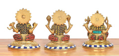 Back view multicolor brass Ganesh idols with spiked crown on blue-striped bases
