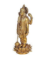 Brass Lord Vishnu statue in side view, detailed robe and lotus base