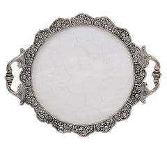 Ornate round silver tray base with detailed filigree border