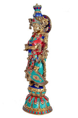 Brass Radha Krishna sculpture, three-quarter view with blue crown and teal dress