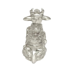 Brass Nandi cow idol statue with folded legs and detailed waist ornament