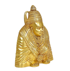 Brass Tulja Bhavani idol, angled view showing jug handle and detailed draped robe