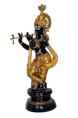 Krishna brass statue profile view, ornate crown, black skin with gold details
