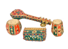 Painted brass sitar with harmonium box and two cylindrical drums, decorative gold details