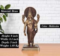 Brass Dhanvantri statue with detailed jewelry, raised arms, and draped robe