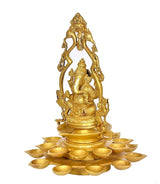 Brass Ganesha diya lamp idol on 20-diya tray, rear-side angle