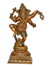Brass Lord Ganesha dancing figurine, detailed ornaments, standing on layered pedestal