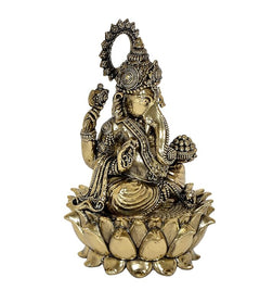 Rear 3/4 view brass Ganesha statue with arching halo and lotus base