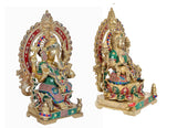Brass Lakshmi and Ganesh idols from side angles, ornate arch frames and painted garments