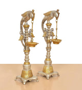 Parrot diya oil lamp stands, set of 2, angled view showing flame cup and chain detail