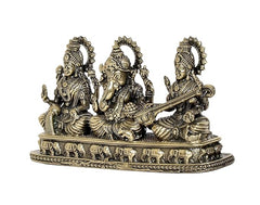 Side view brass Ganesha Lakshmi Saraswati showpiece with long instrument in hand