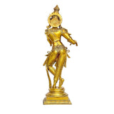 Brass Krishna Murli Manohar statue, side view with halo behind head, draped ornaments