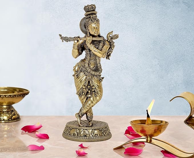 Brass Lord Krishna idol figurine, standing and playing flute on ornate pedestal
