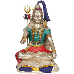 Brass Lord Shiva idol with trident, seated in meditation, turquoise and red detailing