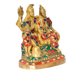 Brass Shiv Parivar family idol, angled view, decorated red green blue patterned robes